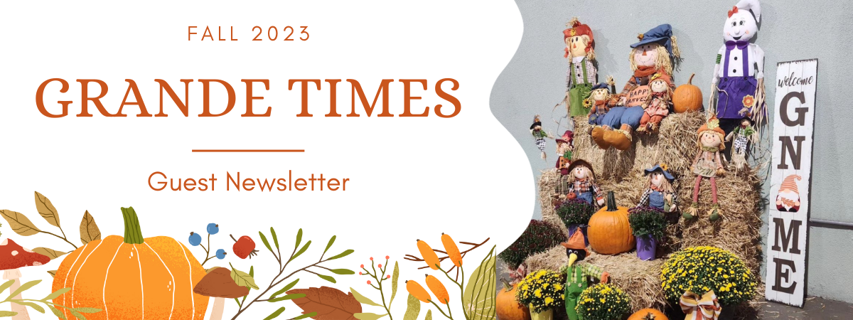 Cover of 'Grande Times' Fall 2023 newsletter with autumn decorations.