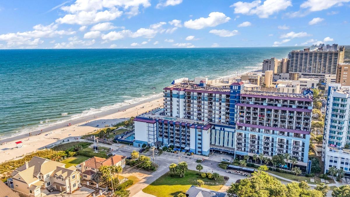Aerial view of Grande Shores Ocean Resort on the beach in Myrtle Beach, ideal oceanfront lodging for visitors attending the Myrtle Beach Jeep Jam.