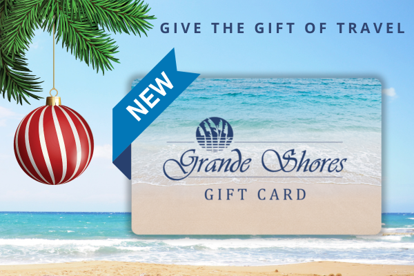 New Grande Shores gift card promotion with beach backdrop and holiday theme.